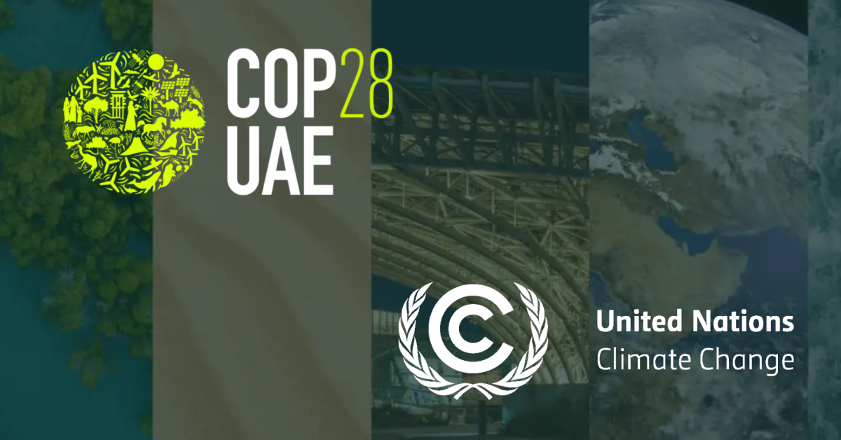 The COP28 logo and the United Nations logo over a faded background of a globe